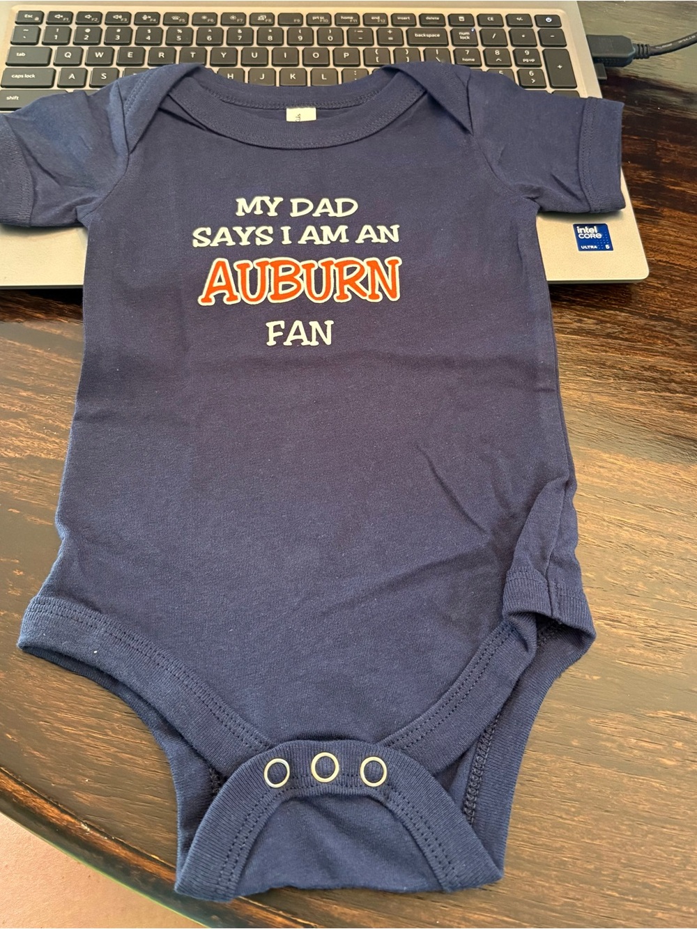 Bella Canvas Navy Baby One-Piece with Orange & White Auburn Graphic